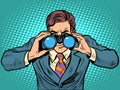 Businessman looking through binoculars. Lead vision Navigator Royalty Free Stock Photo