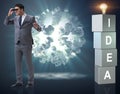 Businessman looking for bright ideas Royalty Free Stock Photo