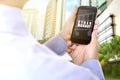 Businessman looking at Cyber Monday advert on the phone screen Royalty Free Stock Photo