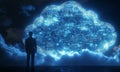 Businessman looking at digital cloud computing with circuit patterns at night Royalty Free Stock Photo