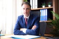 Businessman looking with documents on table in his office Royalty Free Stock Photo