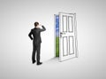 Businessman looking at drawing door