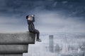 Businessman looking his vision on rooftop