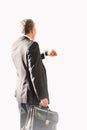 Businessman looking on his watch while waiting for boarding in airport Royalty Free Stock Photo