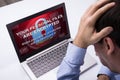 Businessman Looking At Laptop With Ramsomware Word On The Screen Royalty Free Stock Photo