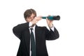 Businessman looking a spyglass