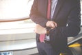 Businessman looking at the time on his wrist watch Royalty Free Stock Photo