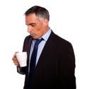 Businessman looking to a empty mug Royalty Free Stock Photo
