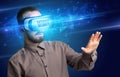 Businessman looking through Virtual Reality glasses, virtual security concept Royalty Free Stock Photo