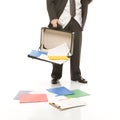 Businessman losing papers