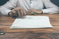 ..Businessman with magnifying glass reading documents Royalty Free Stock Photo