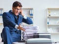 Businessman making copies in copying machine