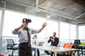 Businessman making gestures when wearing virtual goggles Royalty Free Stock Photo