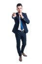 Businessman making keep a secret gesture standing on white backg Royalty Free Stock Photo