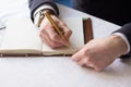 Businessman making notes on the paper Royalty Free Stock Photo