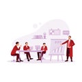 Businessman making project presentation on a flip chart. Businessman giving briefing during a meeting with colleagues in office. Royalty Free Stock Photo