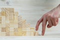 businessman making a pyramid with empty wooden cubes Royalty Free Stock Photo