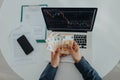 Businessman man counting euro money working on computer at office desk, inflation concept., top view. Royalty Free Stock Photo