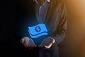 Businessman man holding money coin icon in his hands.Growing money concept for business investment and finance. USD or US dollar Royalty Free Stock Photo