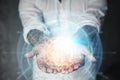 Businessman man holds a hologram of planet earth on his hand. Globalization, network, fast Internet, new technologies in