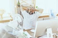 Businessman, manager in office with computer and fan cooling off, feeling hot, flushed