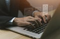 Businessman managing electronic documents on the laptop. Royalty Free Stock Photo