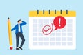 Businessman marks important day on calendar with red circle Royalty Free Stock Photo
