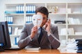 The businessman with mask in office hypocrisy concept Royalty Free Stock Photo