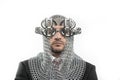 businessman with medieval executioner in metal and silver glasses. concept of protection of savings and money