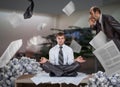 Businessman meditates among piles of reports