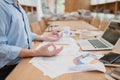 Businessman meditating in office doing yoga in lotus pose Royalty Free Stock Photo