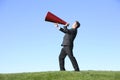Businessman with megaphone Royalty Free Stock Photo