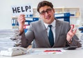 Businessman missing deadlines due to excessive work Royalty Free Stock Photo