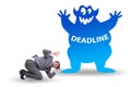 Businessman missing important deadline with monster