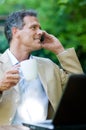 Businessman on mobile outdoor Royalty Free Stock Photo