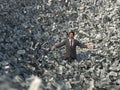 Businessman in a money avalanche