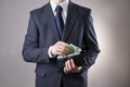 Businessman with money in purse in hands Royalty Free Stock Photo