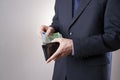 Businessman with money in purse in hands Royalty Free Stock Photo