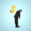 Businessman with money symbol winder on his back