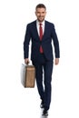 Businessman moving towards his vacation with a big smile Royalty Free Stock Photo