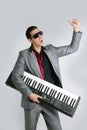 Businessman musician playing instrument with suit Royalty Free Stock Photo