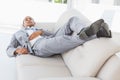 Businessman napping on the couch Royalty Free Stock Photo