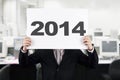 Businessman with New Year 2014 Royalty Free Stock Photo