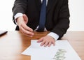 Businessman offering a cooperation and money Royalty Free Stock Photo