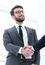 Bussines hand shaking will show succesful cooperation.