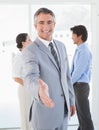 Businessman offering to shake hands Royalty Free Stock Photo