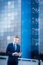 Businessman and office block Royalty Free Stock Photo