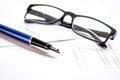 businessman office desk with contract for signig, glasses and pen Royalty Free Stock Photo