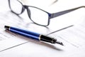 businessman office desk with contract for signig, glasses and pen Royalty Free Stock Photo