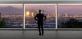 Businessman in an office looking at the view of downtown Los Angeles Royalty Free Stock Photo